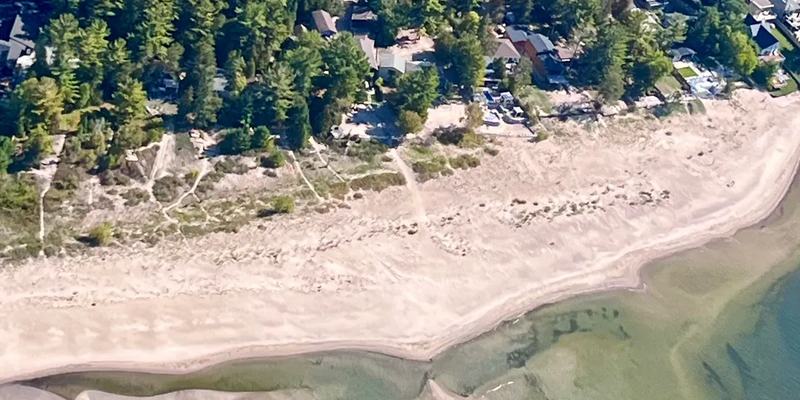The dune line and the shallows along the shore